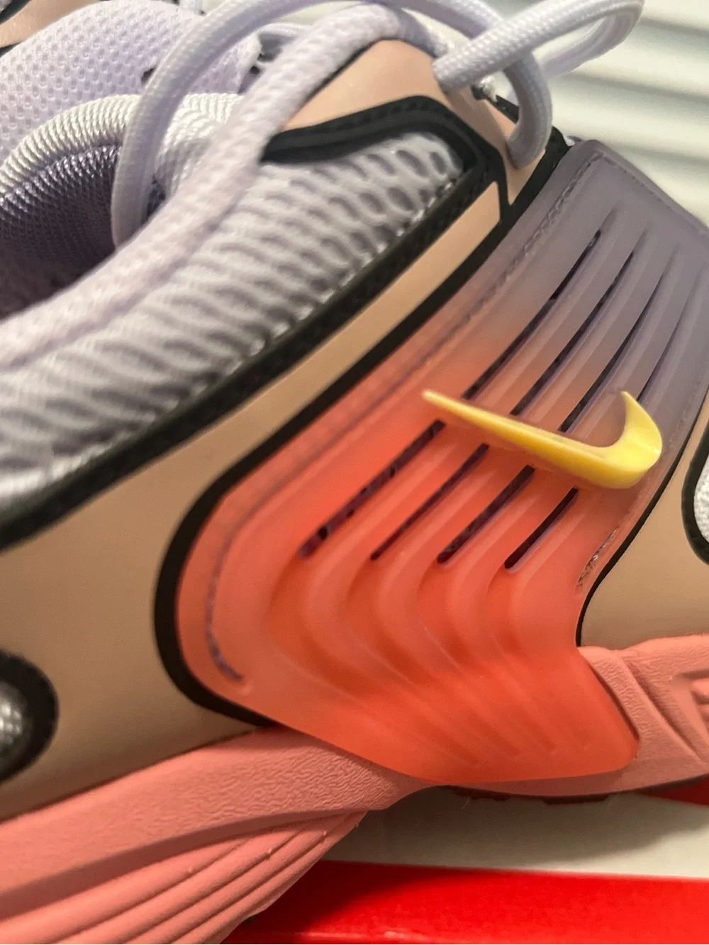 Nike men’s Pink and Gray Sneakers with Yellow Swoosh